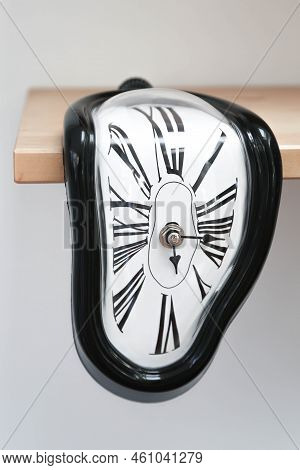 Decorative Clocks Drain Off The Shelf. The Clock Is A Symbol Of The Impermanence Of Time.