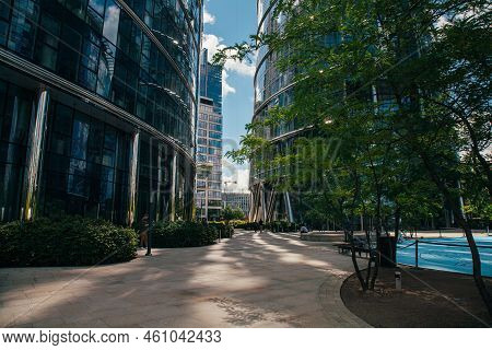 Warsaw, Poland - June 22, 2022: Downtown Architecture. Modern City Industry. Street Place With Glass