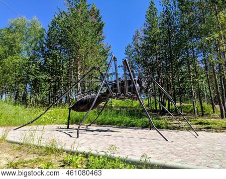 Noyabrsk, Russia - July 6, 2022: Sculpture Of A Mosquito In The City Park Of The City Of Noyabrsk. M