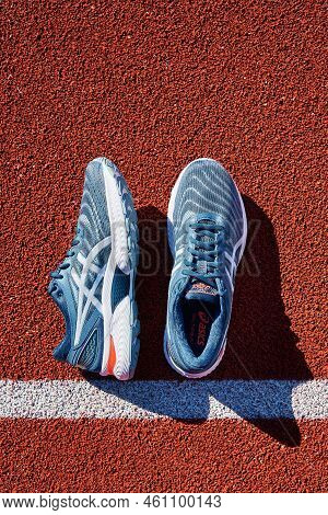 Asics Gel Nimbus Running Shoes At Stadium Track, Pair Of Asics Sport Sneakers For Jogging. Katy Wroc