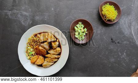 Pempek Or Empek-empek Or Fish Cake Is A Food Made From Soft Ground Fish Meat Mixed With Tapioca Flou