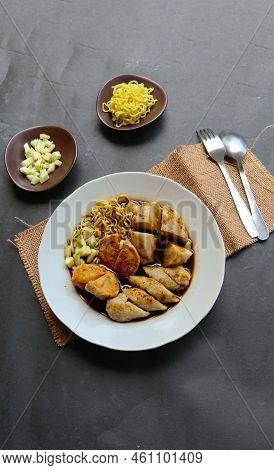Pempek Or Empek-empek Or Fish Cake Is A Food Made From Soft Ground Fish Meat Mixed With Tapioca Flou