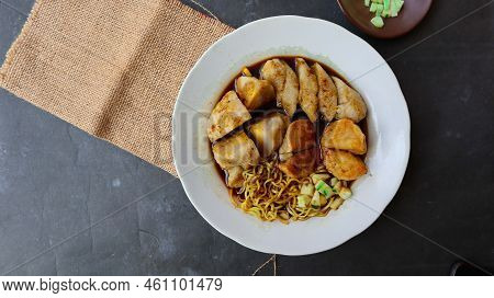 Pempek Or Empek-empek Or Fish Cake Is A Food Made From Soft Ground Fish Meat Mixed With Tapioca Flou