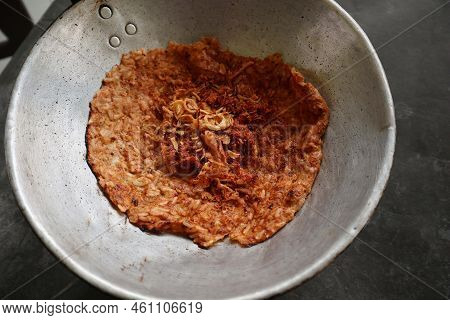 Kerak Telor Or Egg Crust. Kerak Telor Is Spicy Glutinous Rice Omelette With Grated Coconut. Made Fro