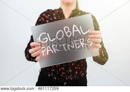 Hand Writing Sign Global Partnerstwo Or More Firms From Different Countries Work As A Team. Concept 