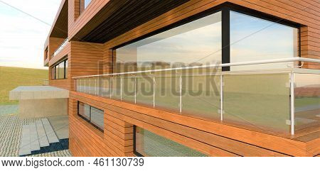 Wooden Wall Of A Suburban House. Mirror Reflection Windows. Spacious Terrace With Fence Made Of Glas