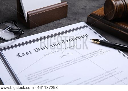Last Will And Testament With Pen On Grey Table, Closeup
