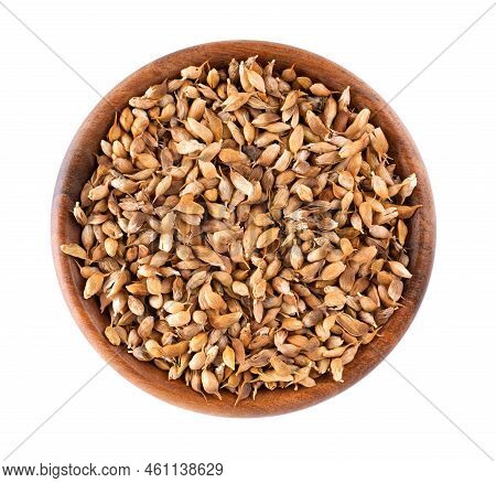 Utsho Suneli Seeds In Wooden Bowl, Isolated On White Background. Trigonella Caerulea Or Blue Fenugre