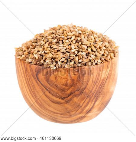 Utsho Suneli Seeds In Wooden Bowl, Isolated On White Background. Trigonella Caerulea Or Blue Fenugre