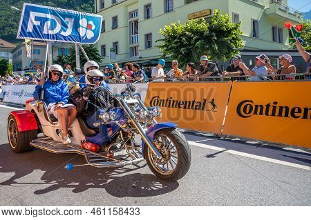 Aigle, Valais Canton, Switzerland -july 10, 2022: Passage Of An Advertising Car Of Groupama Fdj In T