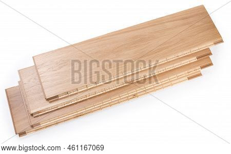 Stack Of The Three-layer Engineered Wood Flooring Boards With White Oak Face Layer, Pine Core Layer 
