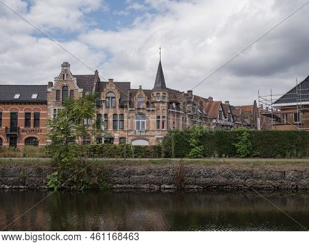 Lokeren, Belgium, August 27, 2022, Beautiful Building With Tower On The Large Quay And The River Dur
