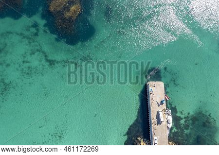 Aerial View Of The Pier At Leabgarrow On Arranmore Island In County Donegal, Republic Of Ireland