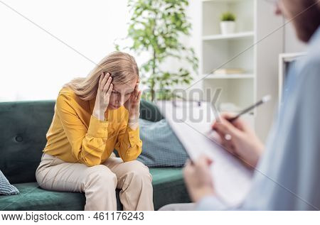 Depressed Woman Talking About Her Problems, Session Of Psychology And Mental Health Support, Doctor 