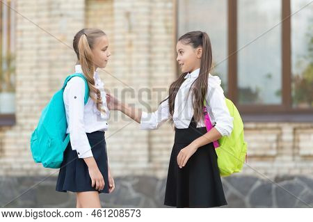 Two School Students Friends Talking Together Outdoor. Communication