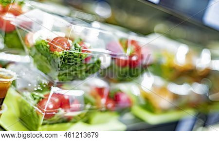 Vegetable Salads Displayed In A Commercial Refriger