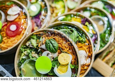 Vegetable Salads Displayed In A Commercial Refriger