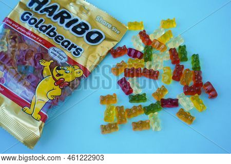 Pskov, Russia - August 09, 2022: A Package Of Sweet Haribo Chewing Bears On A Blue Background. Top V