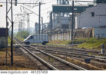 Ryazan, Russia - August 29, 2022: Car Driving Through A Railroad Crossing. Railroad Crossing. Railro