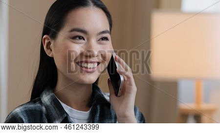 Asian Girl Answering Phone Call Chatting With Friends Calling Mobile Phone Laughing Smiling Friendly