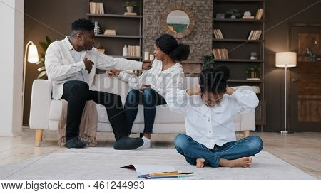 Sad Little African Daughter Child Kid Girl Closing Ears Upset At Parents Fighting Arguing Quarrel Co