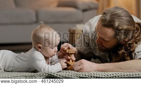 Caucasian Family Bearded Father Daddy Dad With Little Daughter Son Baby Infant Newborn Toddler Playi