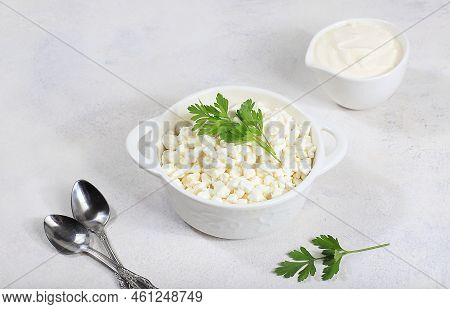Cup With Natural Curd Cheese And Greens,healthy Breakfast With Ingredients,served With Sour Cream Or