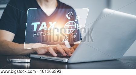 Hand Using Tablet With Bar  Tax Refund And Refund Tax Of Duty Taxation Business, Graphs And Chart Be