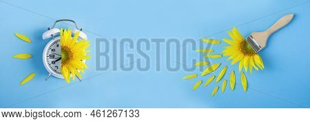 Sunflower On The White Alarm Clock Face And Paintbrush With Sunflower On The Blue Background. Banner