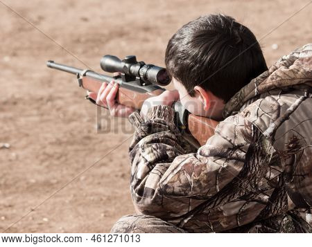 Young Boy Practicing Rifle Marksmanship At The Appleseed Project.
