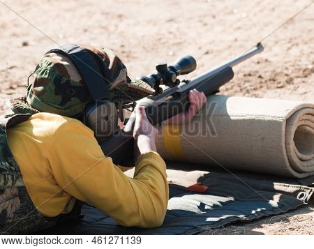 Young Boy Practicing Rifle Marksmanship At The Appleseed Project.
