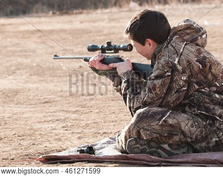 Young Boy Practicing Rifle Marksmanship At The Appleseed Project.