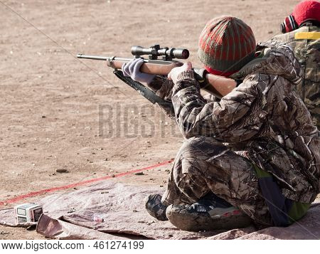 Young Boys Practicing Rifle Marksmanship At The Appleseed Project.