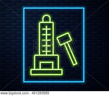 Glowing Neon Line High Striker Attraction With Big Hammer Icon Isolated On Brick Wall Background. At