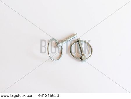 Lynchpins On Isolated White Background With Selective Focus