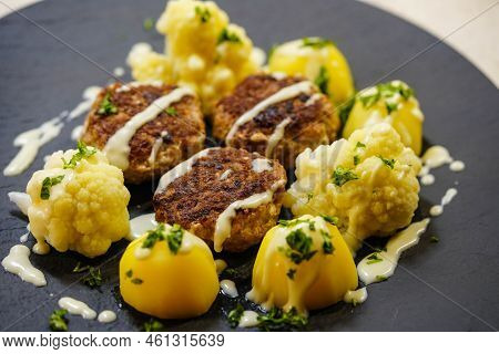 Fried Meatballs With Boiled Cauliglower And Parsley Potatoes