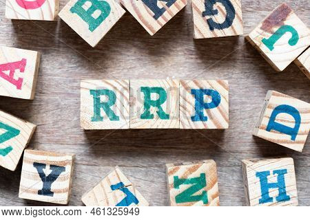 Alphabet Letter Block In Word Rrp (abbreviation Of Recommended Retail Price) And Another Letter On W