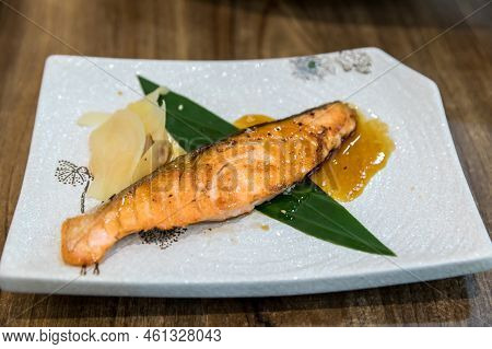 Grilled Salmon On Grill  With Slice Ginger. Fried Salmon Steak. Japanese Salmon Grilled (salmon Shio
