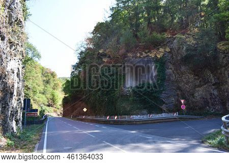Narrow Country Road Between Cliffs On The Hunsrück Side Of Mosel Valley