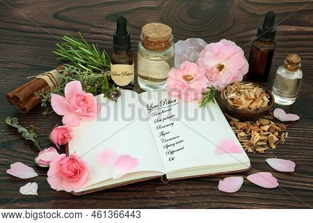 Love Potion Recipe Ingredients With Magic Spell Notebook  With Herbs, Rose Flowers, Oil, Spring Wate