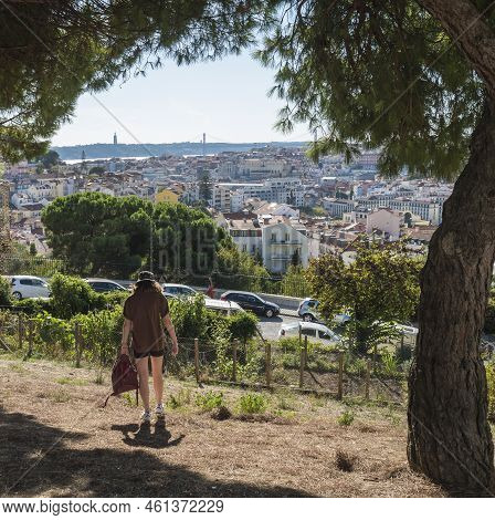 Lisbon, Portugal, October 24, 2021: View Of Alfama Lisbon Old Town From Public Park Jardim Da Cerca 