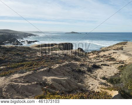 View Of The Cllifs, Rocky Sea Shore With The Red And Green Leaves Of Carpobrotus Edulis, Ground-cree