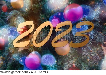 Blurry Bokey Christmas Lights During Holiday Season And 2023 Sign