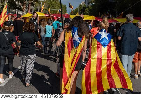 Barcelona, Catalonia, Spain - September 11, 2022: People Participating In The Demonstration Of The N