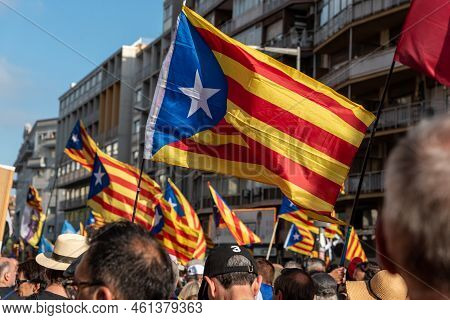 Barcelona, Catalonia, Spain - September 11, 2022: People Participating In The Demonstration Of The N