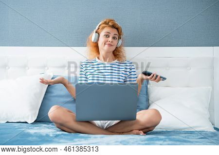 Puzzled Woman Freelancer Has Remote Work. Remote Working Woman Freelancer At Home. Freelancer