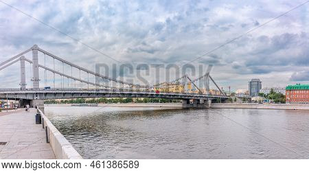 Krymsky Bridge Or Crimean Bridge In Moscow. Steel Suspension Bridge In Moscow Over The Moskva River