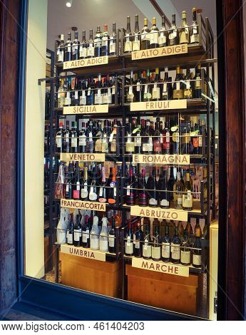 Bologna, Italy - April 3, 2018: Bottles Of Wine From Various Regions Of Italy On Display In A Storef