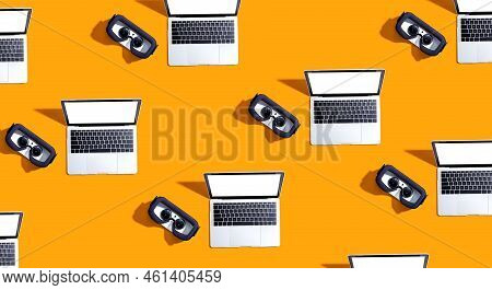 Tech Gear Theme With Vr Headset And A Laptop Computer
