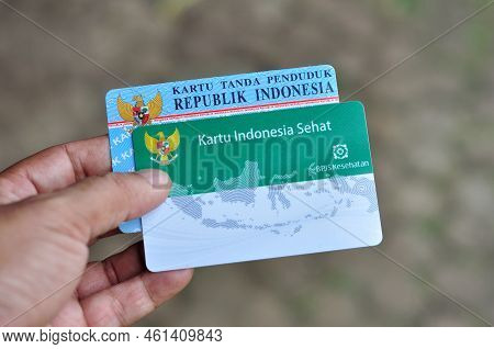 Jakarta, Indonesia - September 12, 2022 : Holds A Healthy Indonesia Card (health Insurance Card From